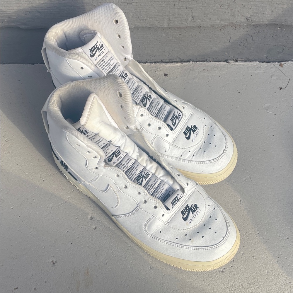 Nike White and Black High-Top Sneakers